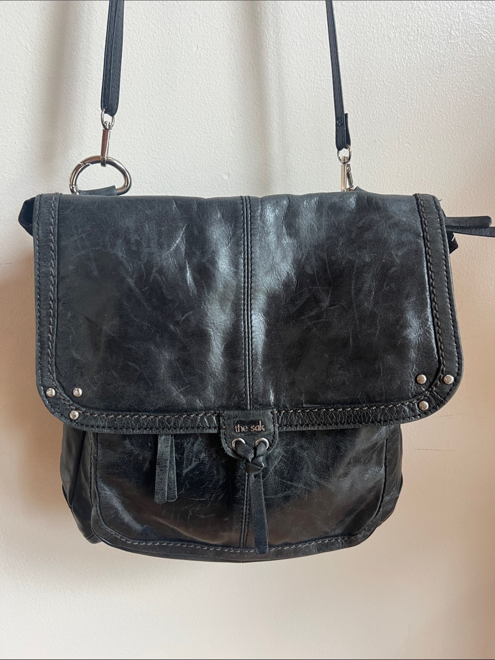 The Sak Ventura convertible backpack to Crossbody with tassel & character